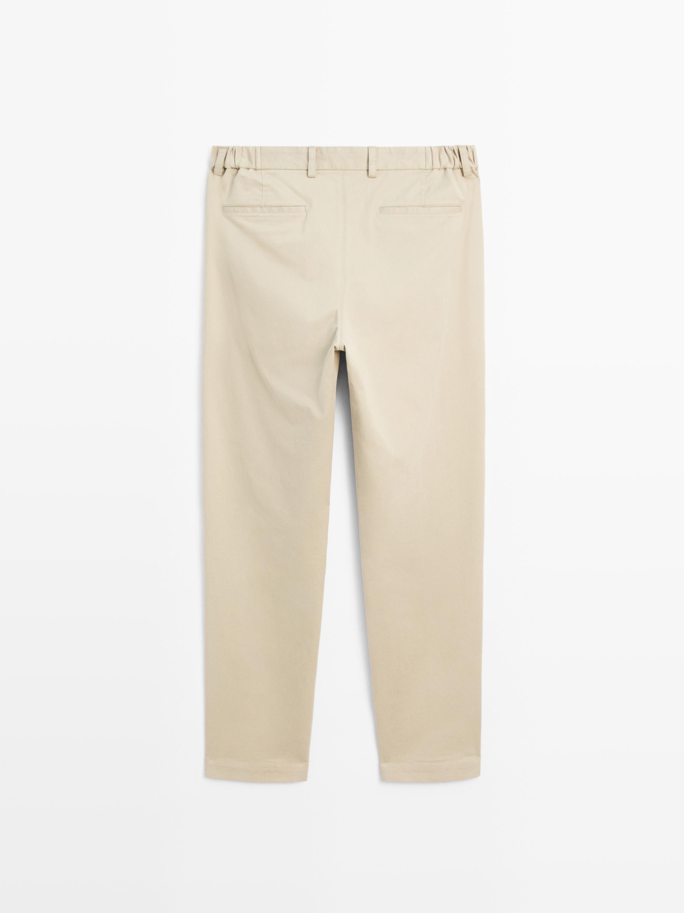 Slim fit trousers with elastic side detail